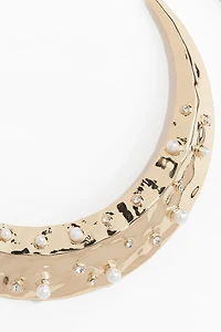 Collier rigide orné de strass