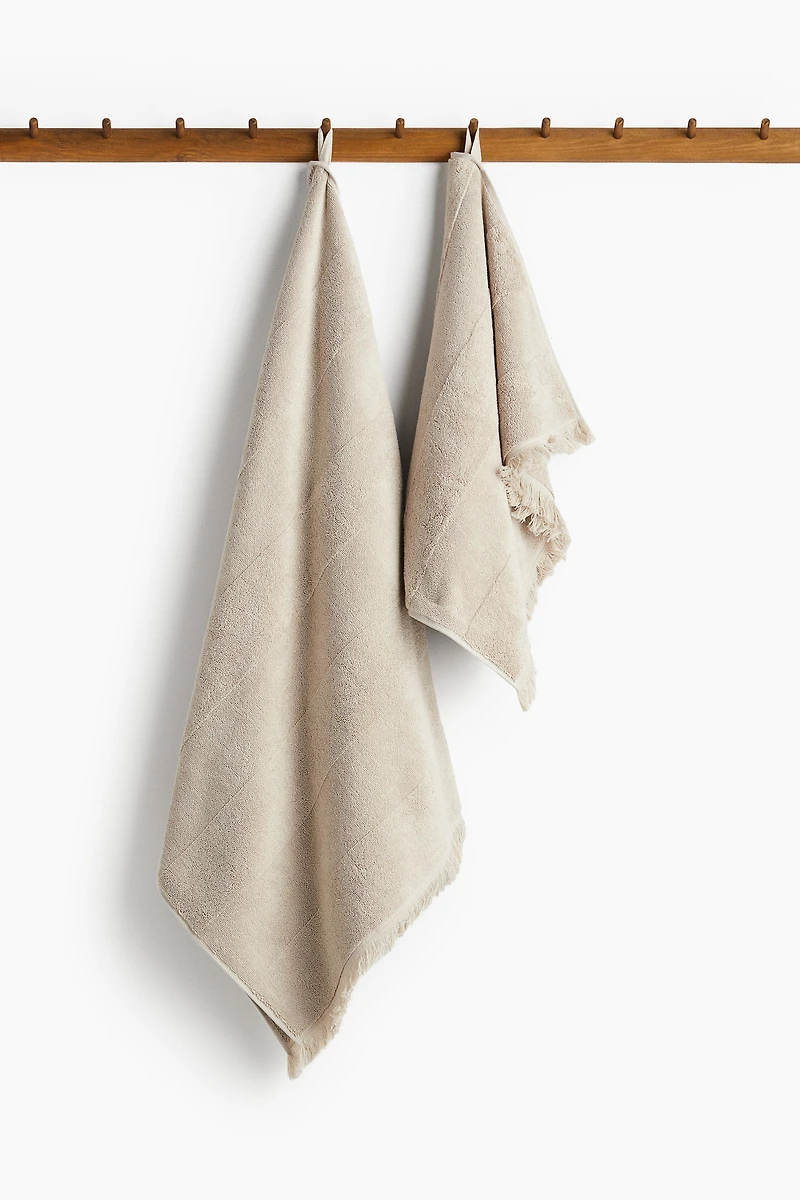 Serviette de bain en coton éponge