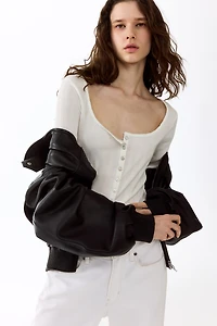 Haut en tricot pointelle