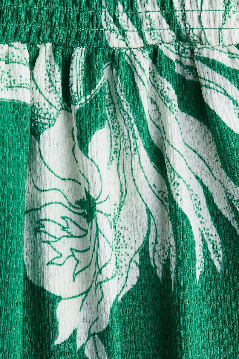 Robe smockée avec bretelles fines