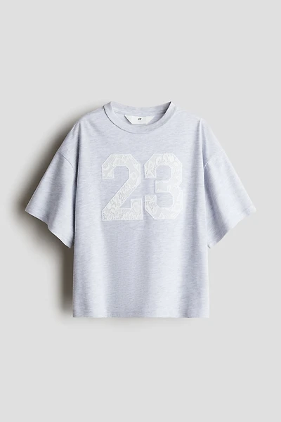 T-Shirt with Text Design