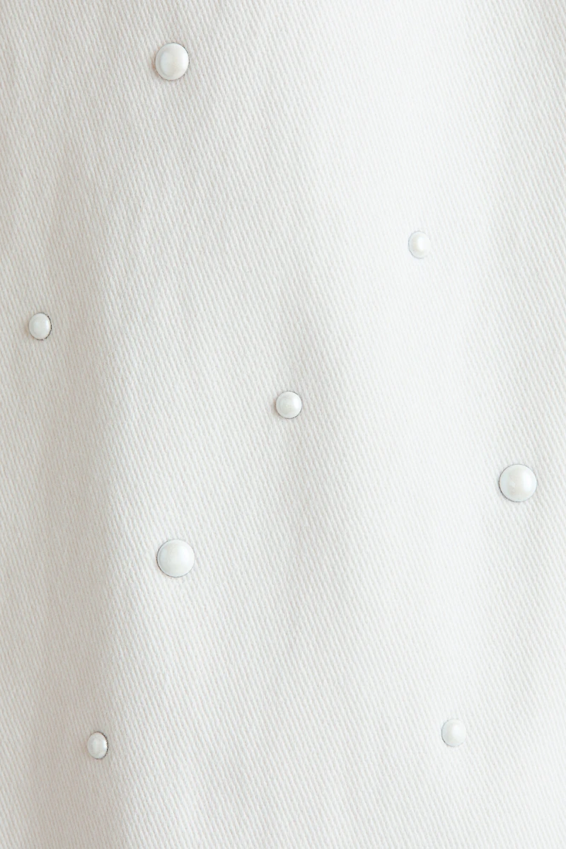 Pantalon évasé avec perles de fantaisie