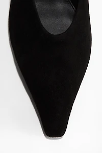 Mules à bout pointu en cuir velours