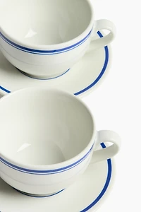 Lot de 2 tasses avec soucoupes en porcelaine