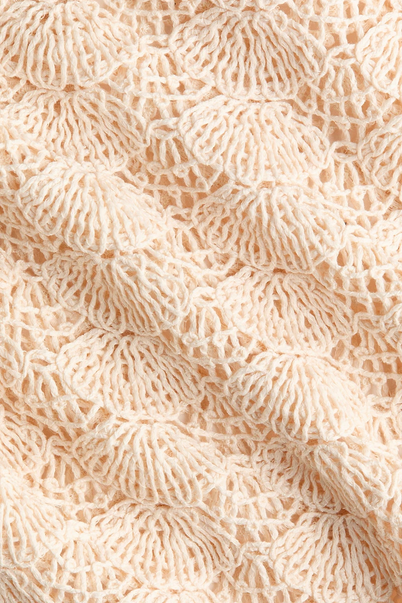 Robe à plis godets en tricot d'aspect crocheté