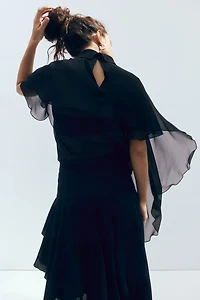 Blouse en mousseline avec détail d'aspect cape