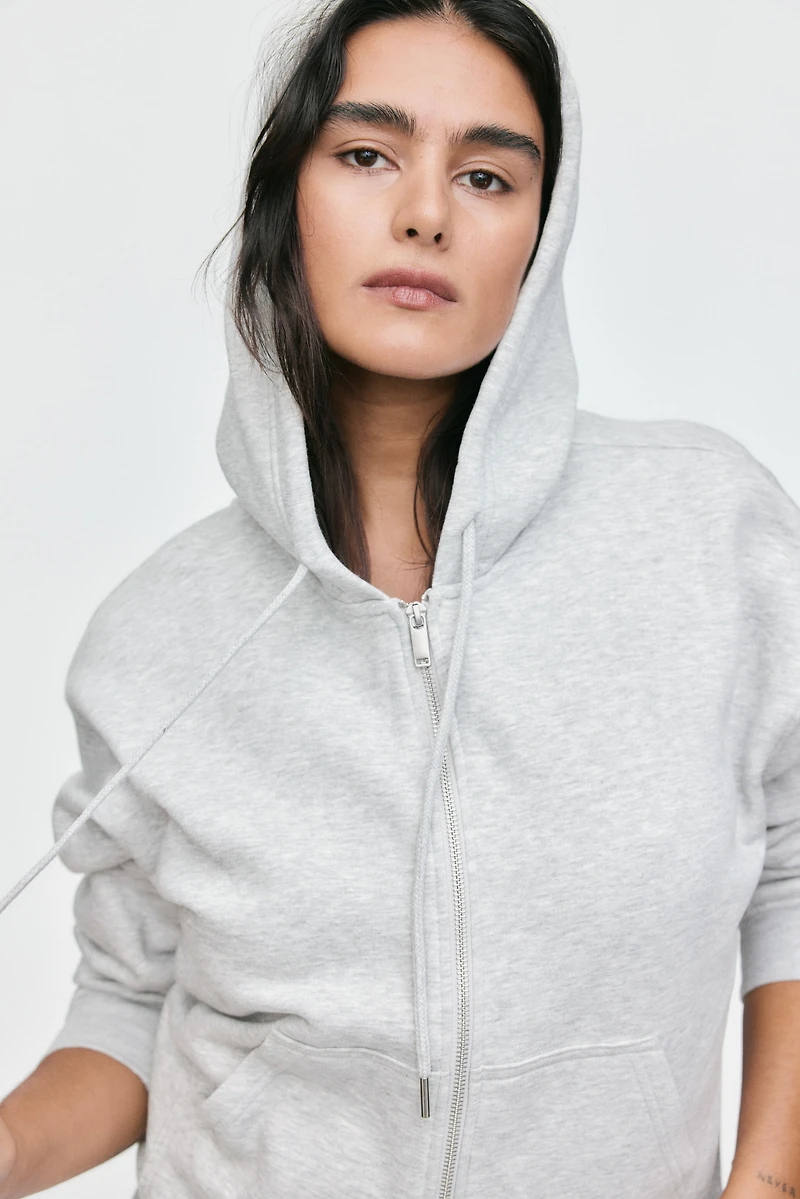 Veste à capuchon glissière