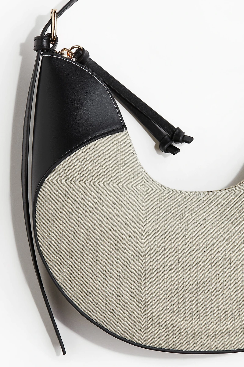 Sac bandoulière en U