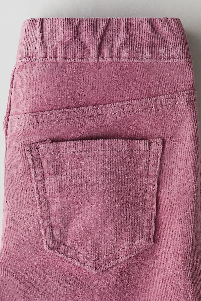 Pantalon ultra-moulant évasé en velours côtelé