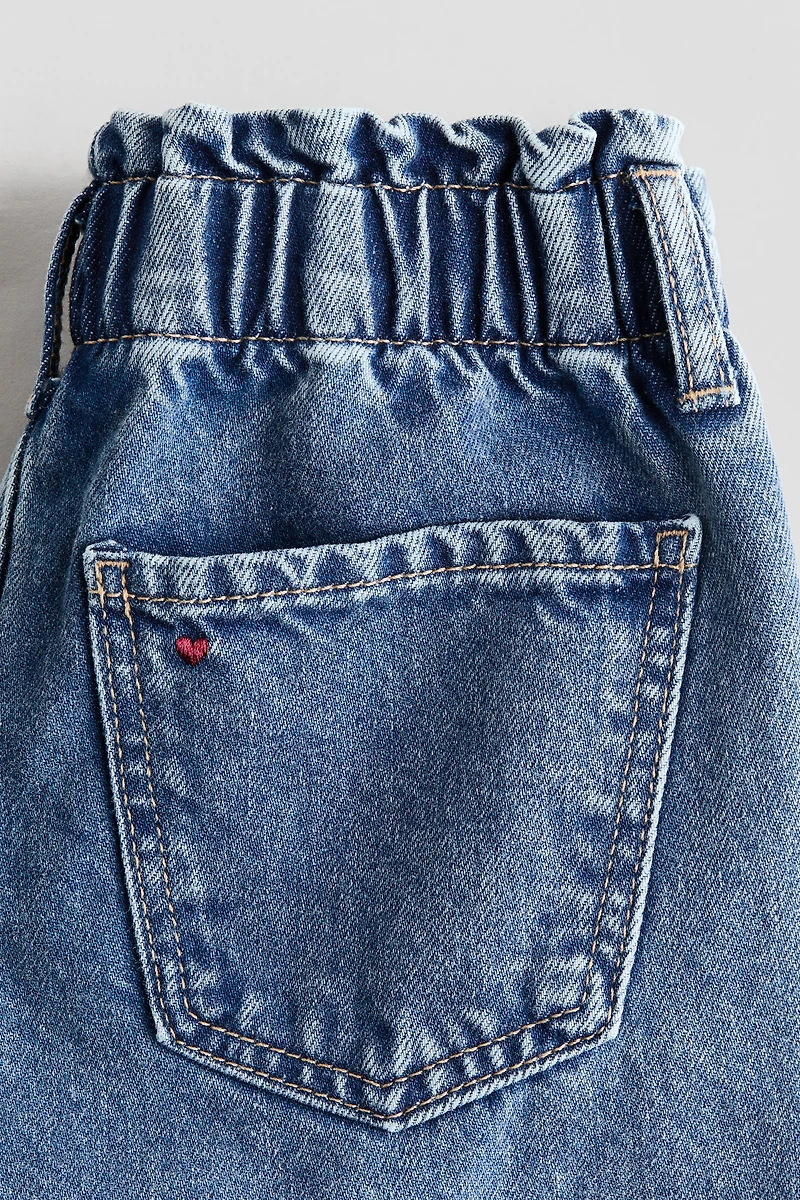 Jean jambes larges sur taille élastique