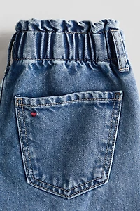 Jean jambes larges sur taille élastique