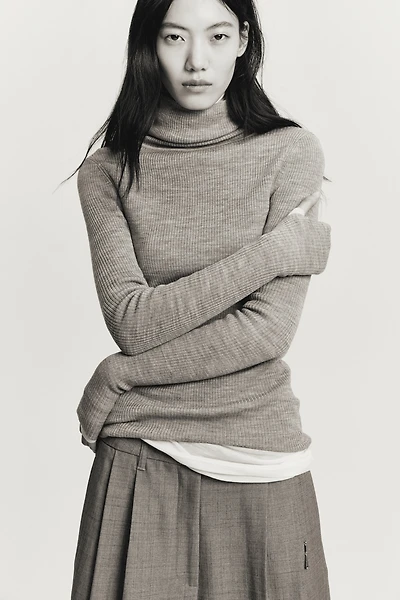 Haut à col roulé en laine mérinos