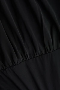 Maillot string drapé à encolure en V