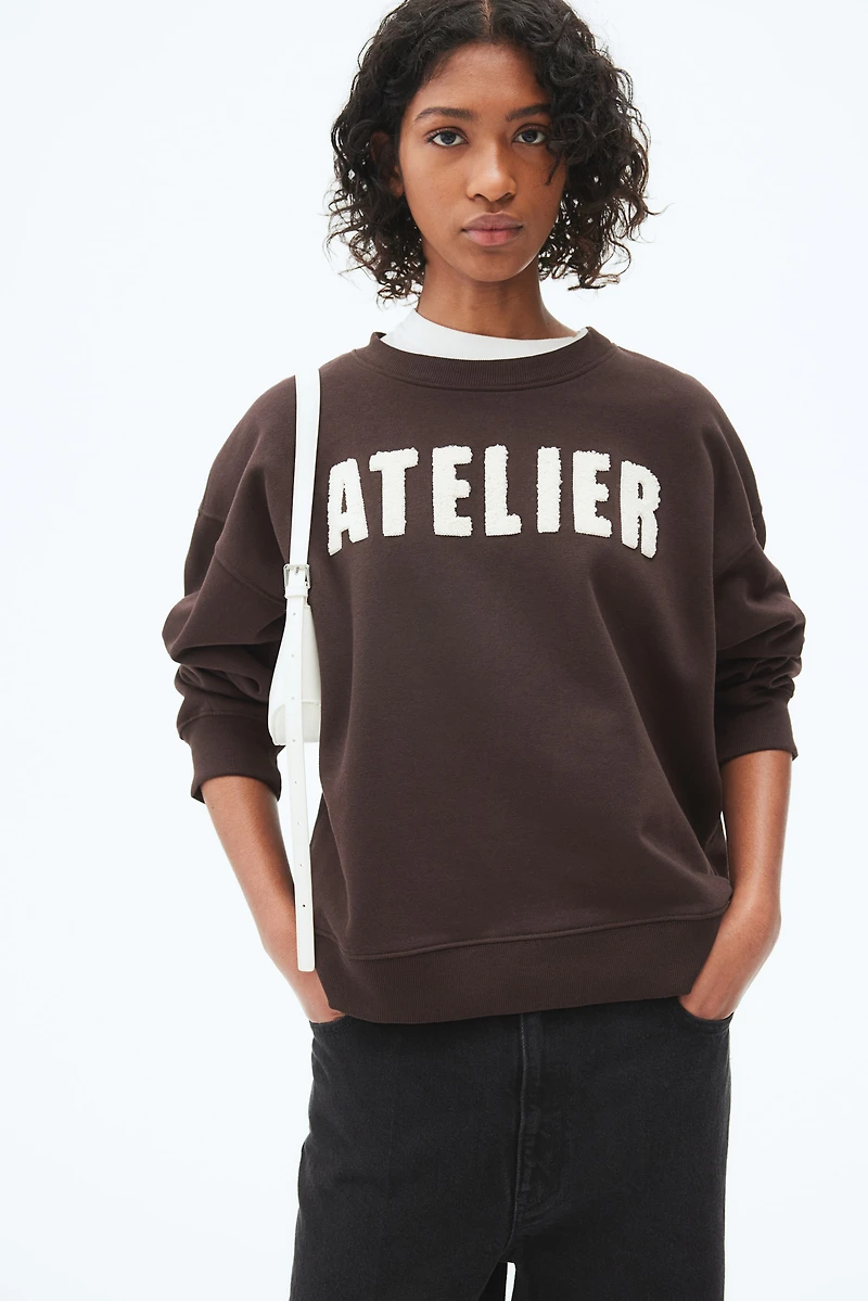 Sweatshirt with Text Motif