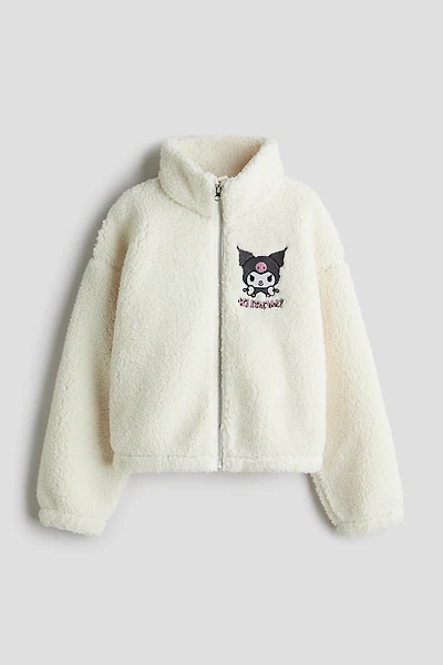 Veste en polar avec motifs