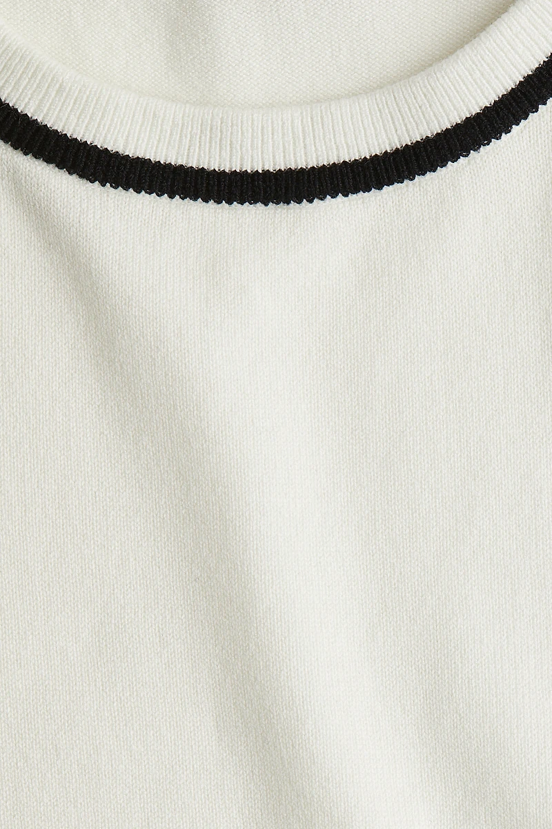 Chandail sans manches en fin tricot