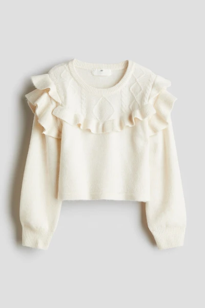 Chandail à bords volantés