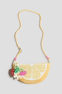 Lemon-shaped crossbody bag