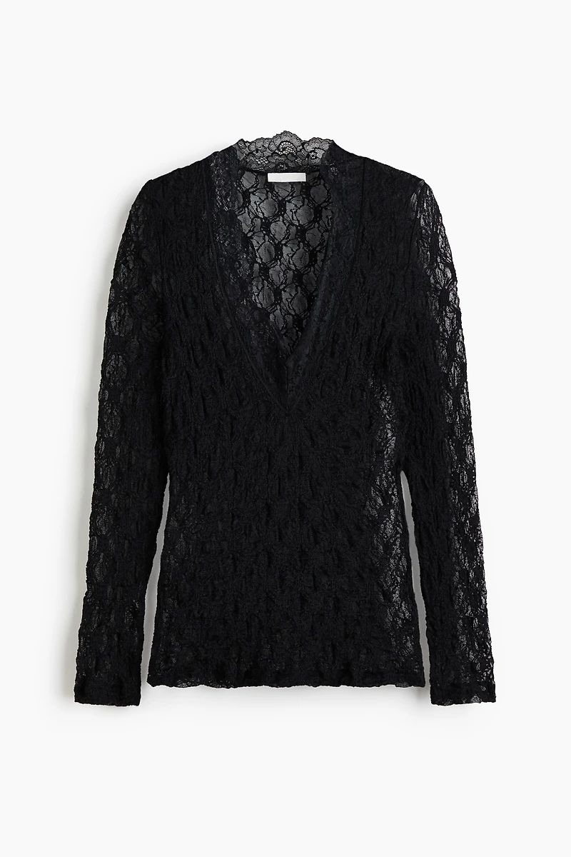 Haut en dentelle avec encolure V