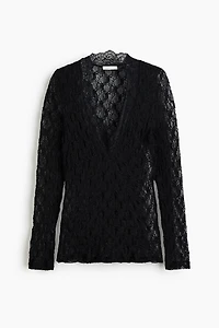 Haut en dentelle avec encolure V