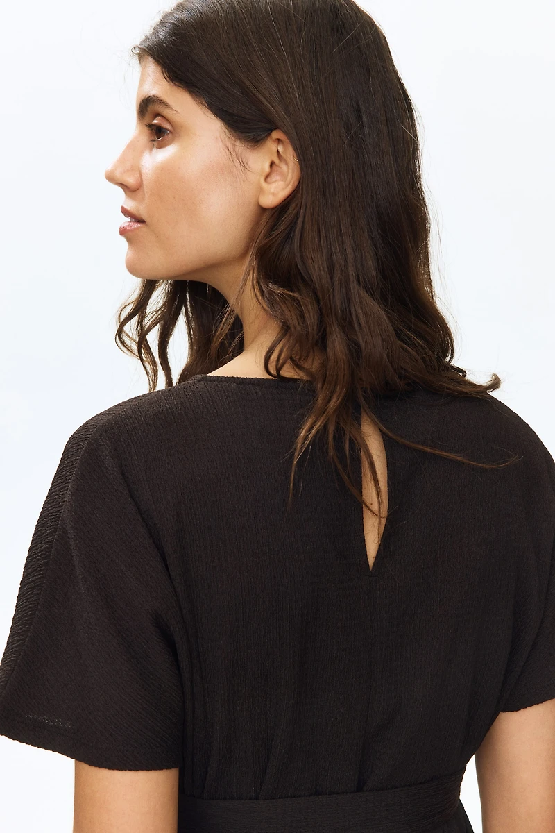 MAMA Short-sleeved tie-belt jumpsuit