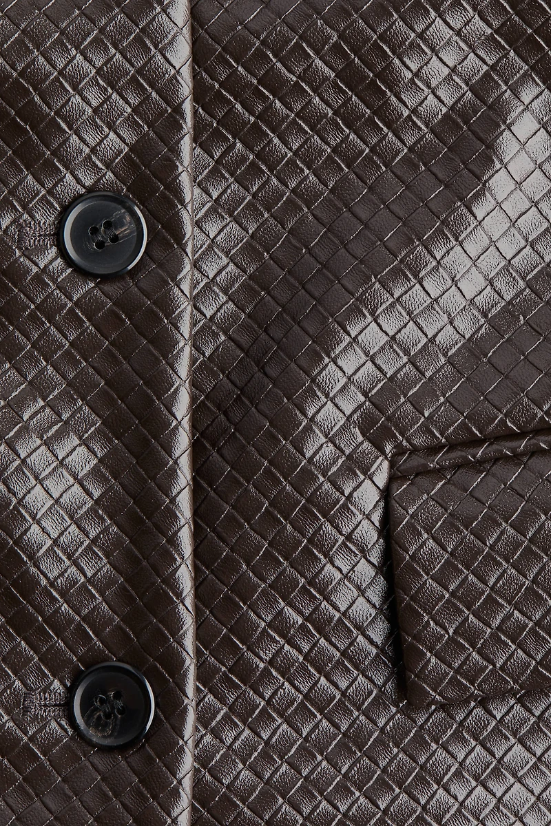 Veste en tissu enduit