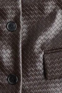 Veste en tissu enduit