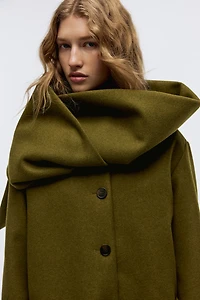 Manteau à écharpe