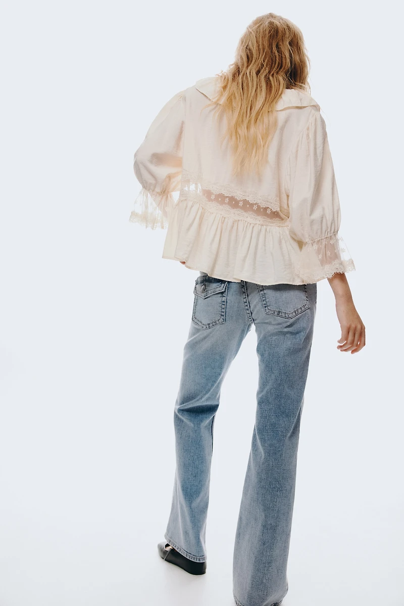 Jean taille basse évasé