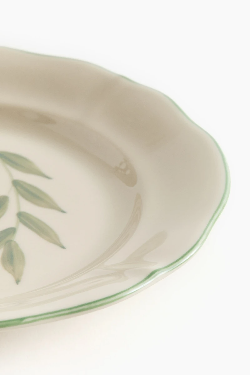 Petite assiette peinte à la main en grès cérame