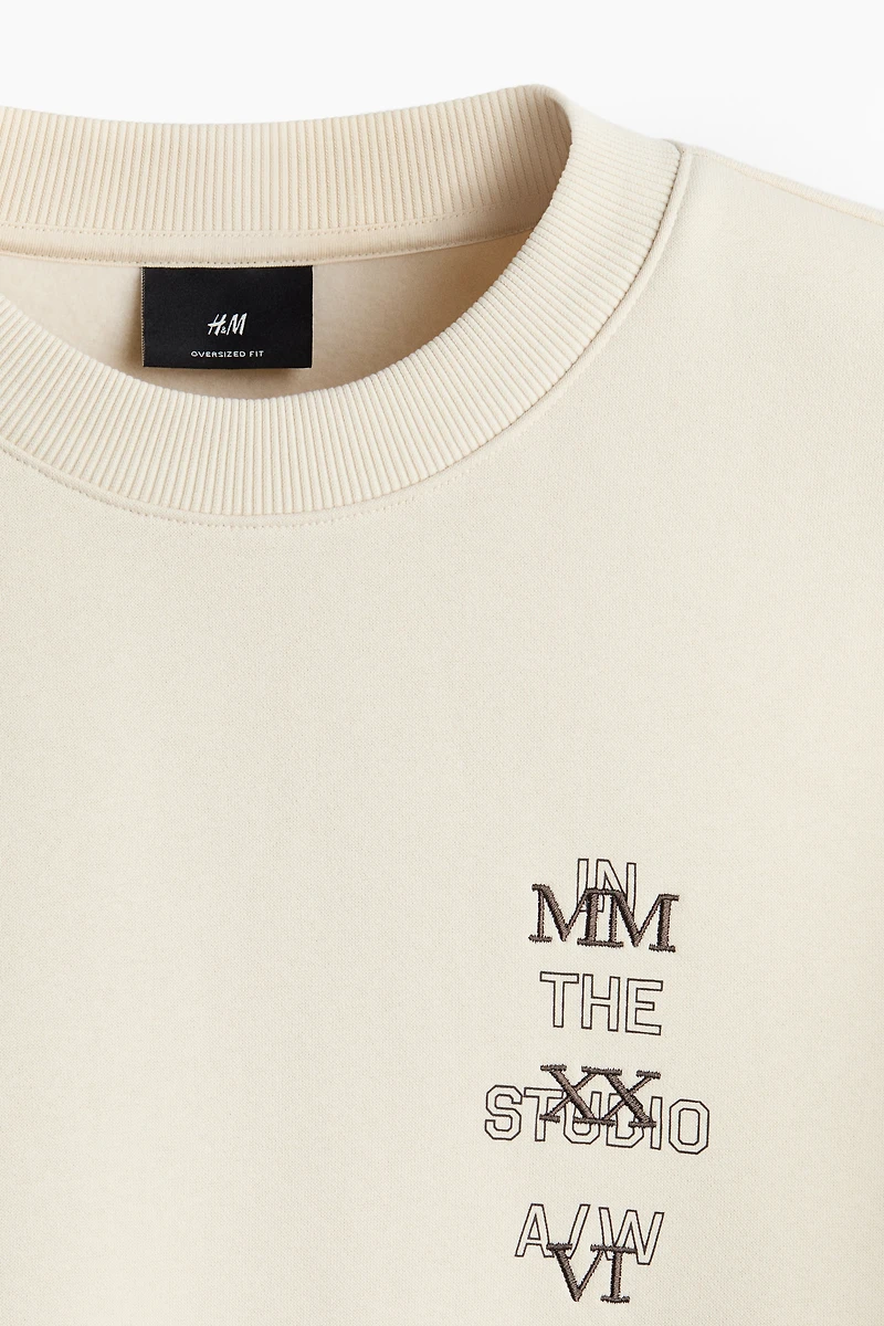 Chandail ample en molleton imprimé