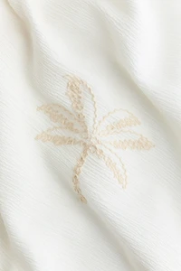 Robe brodée avec cordon de serrage