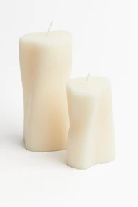 Bougie pilier asymétrique