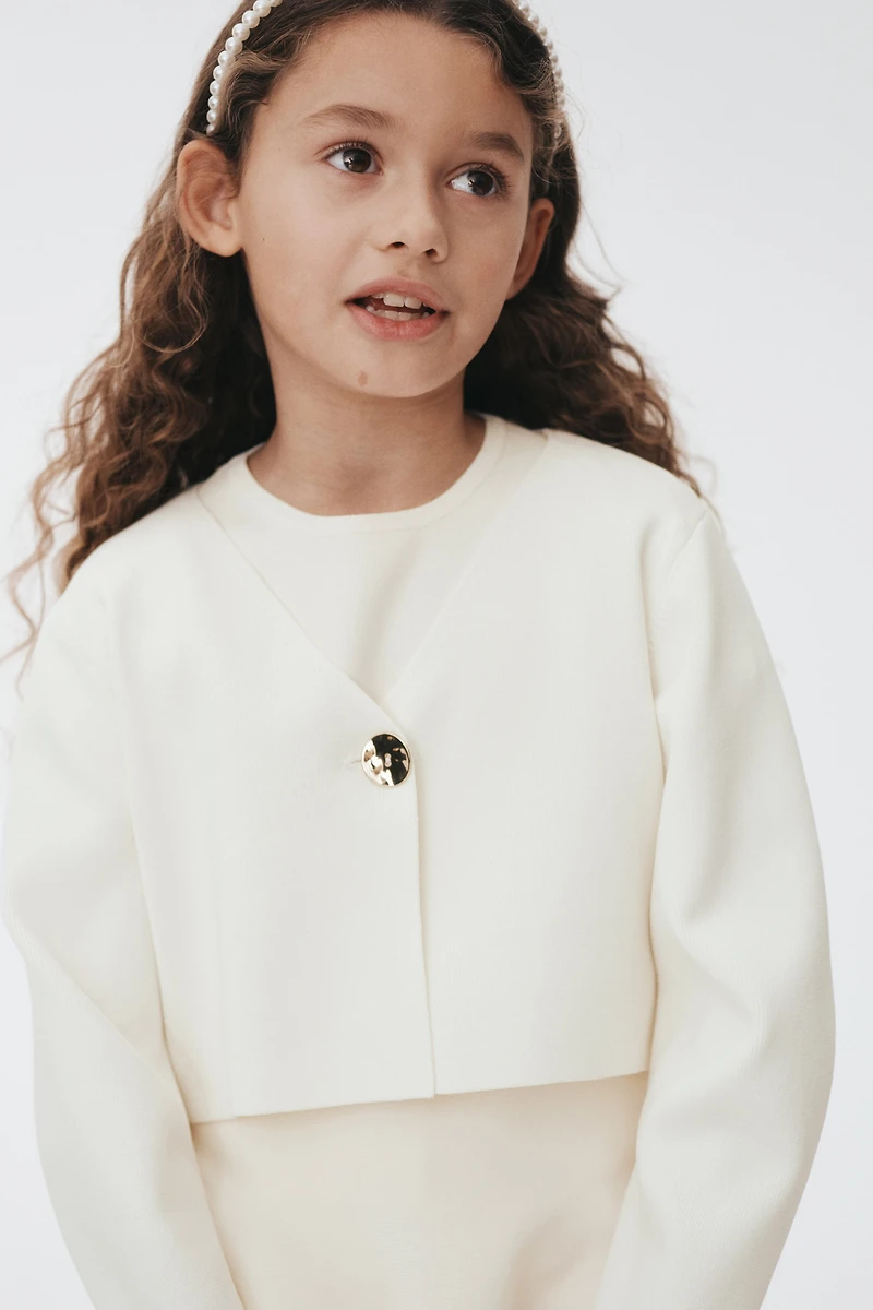 Chandail avec bouton