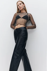 Pantalon en tissu enduit
