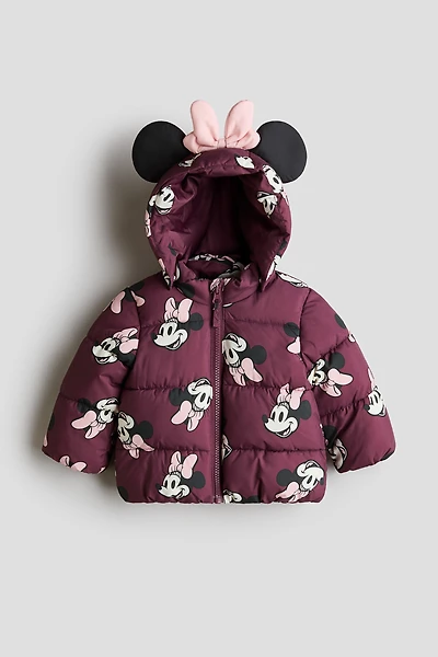 Manteau court matelassé avec appliqués