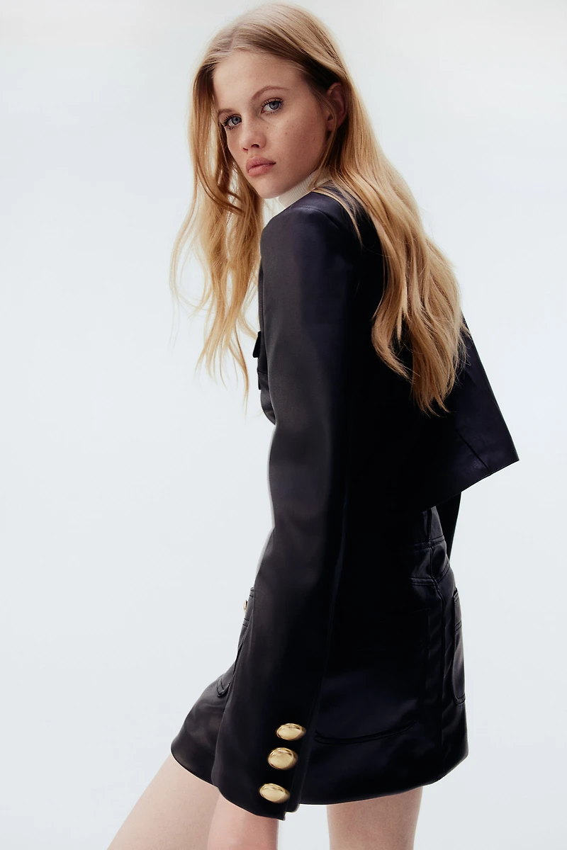 Veste en tissu enduit