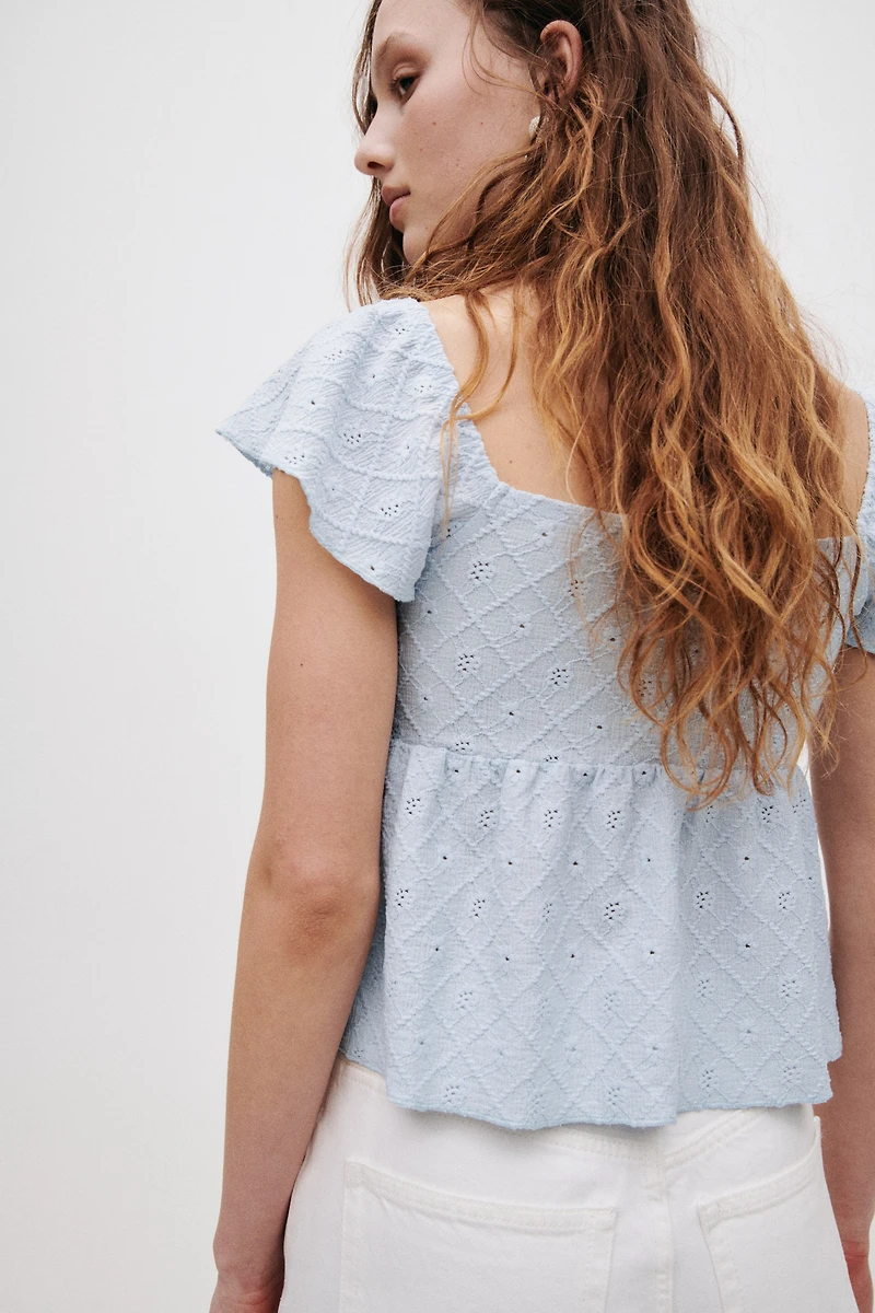 Blouse en jersey pointelle