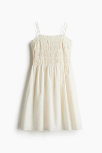 Robe en coton à corsage nid d'abeille