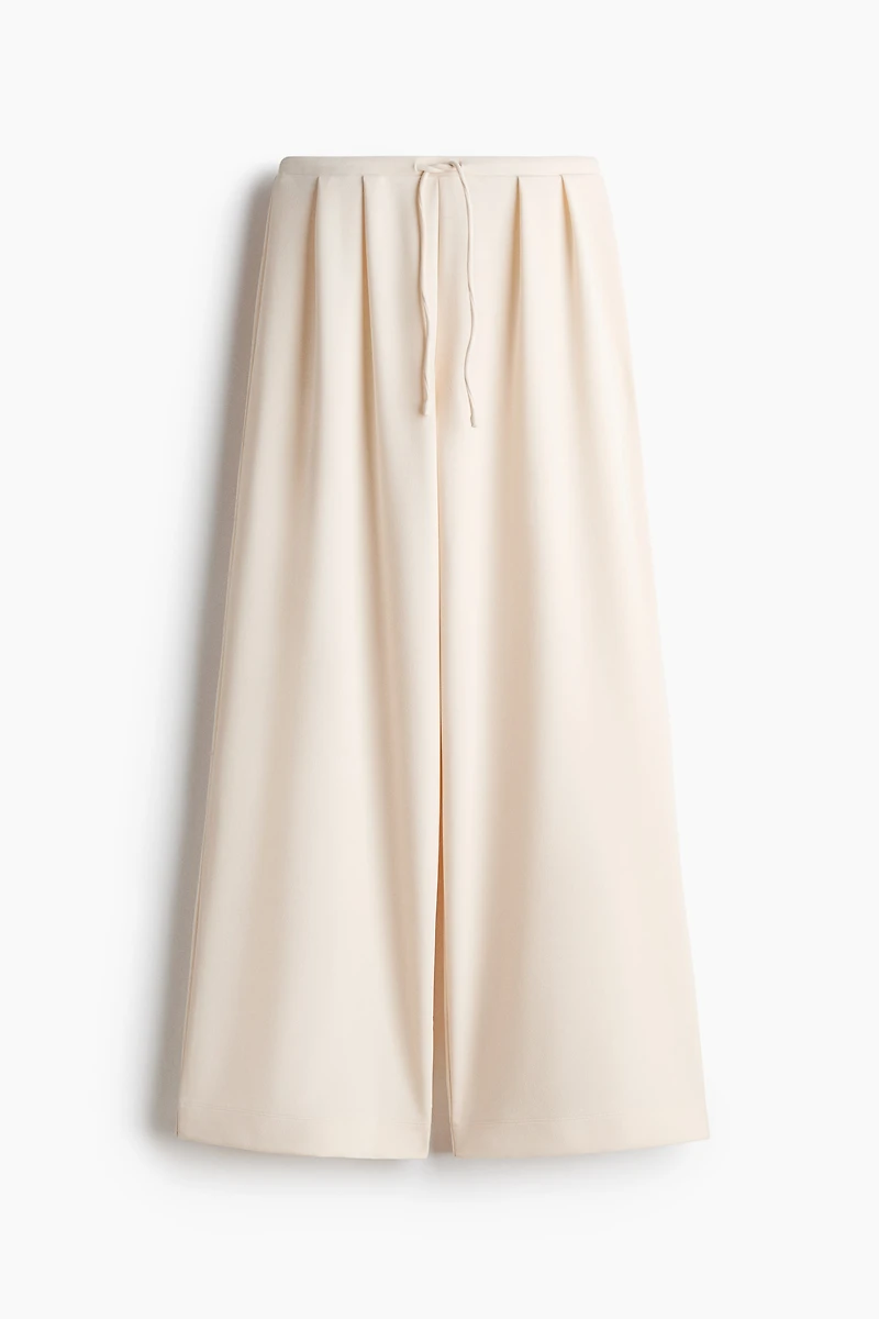 Pantalon plissé avec cordon de serrage