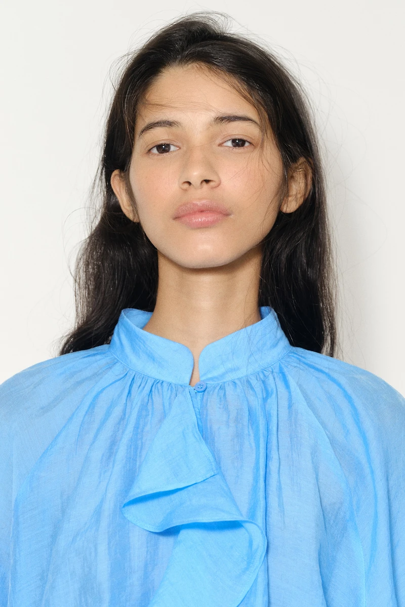 Blouse à volant en lyocell mélangé