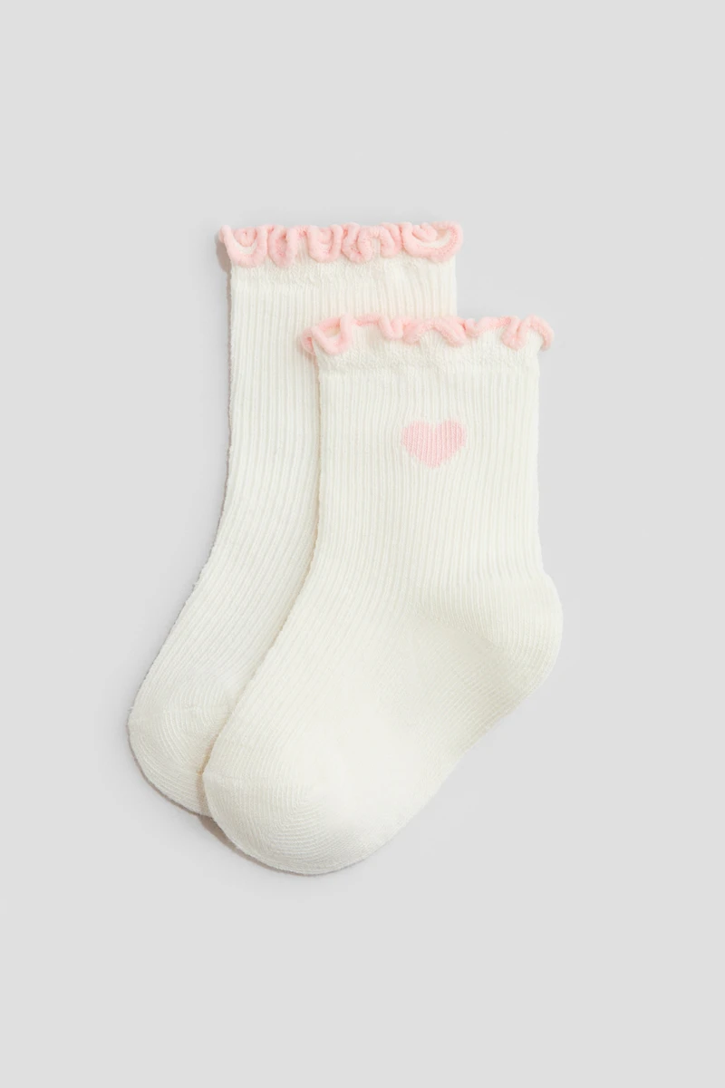 Lot de 4 paires chaussettes à bord surjeté