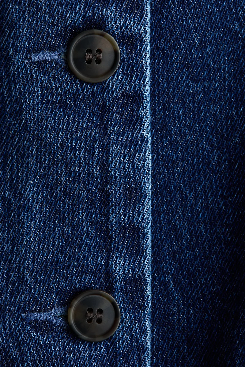 Gilet sans manches avec basque