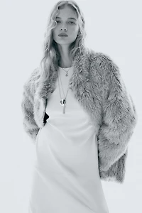 Robe avec dos ouvert et détail à nouer