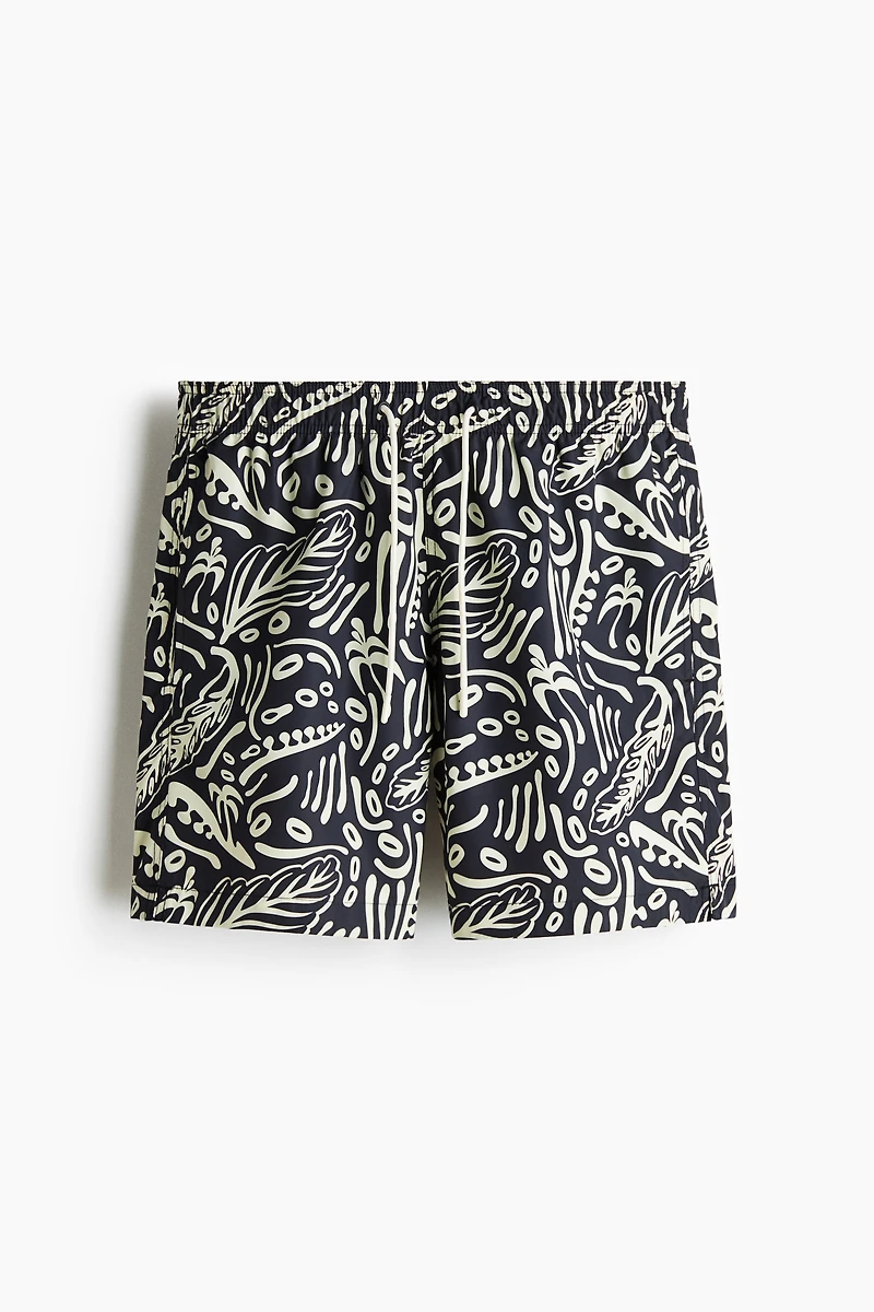 Patterned swim shorts