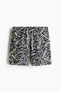 Patterned swim shorts