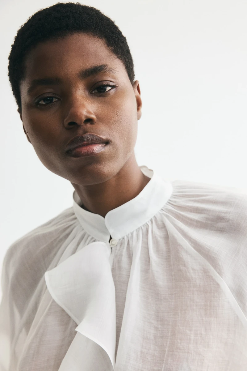 Blouse à volant en lyocell mélangé