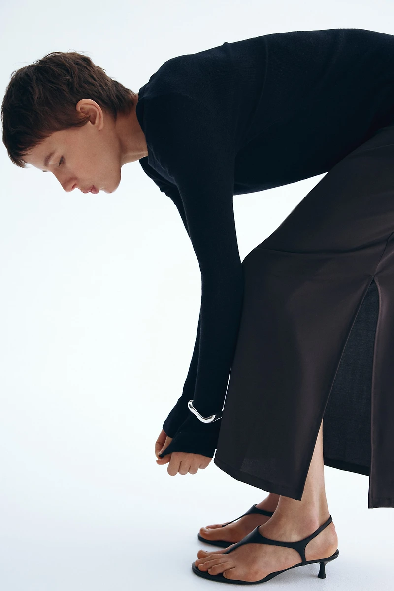 Jupe midi à effet drapé