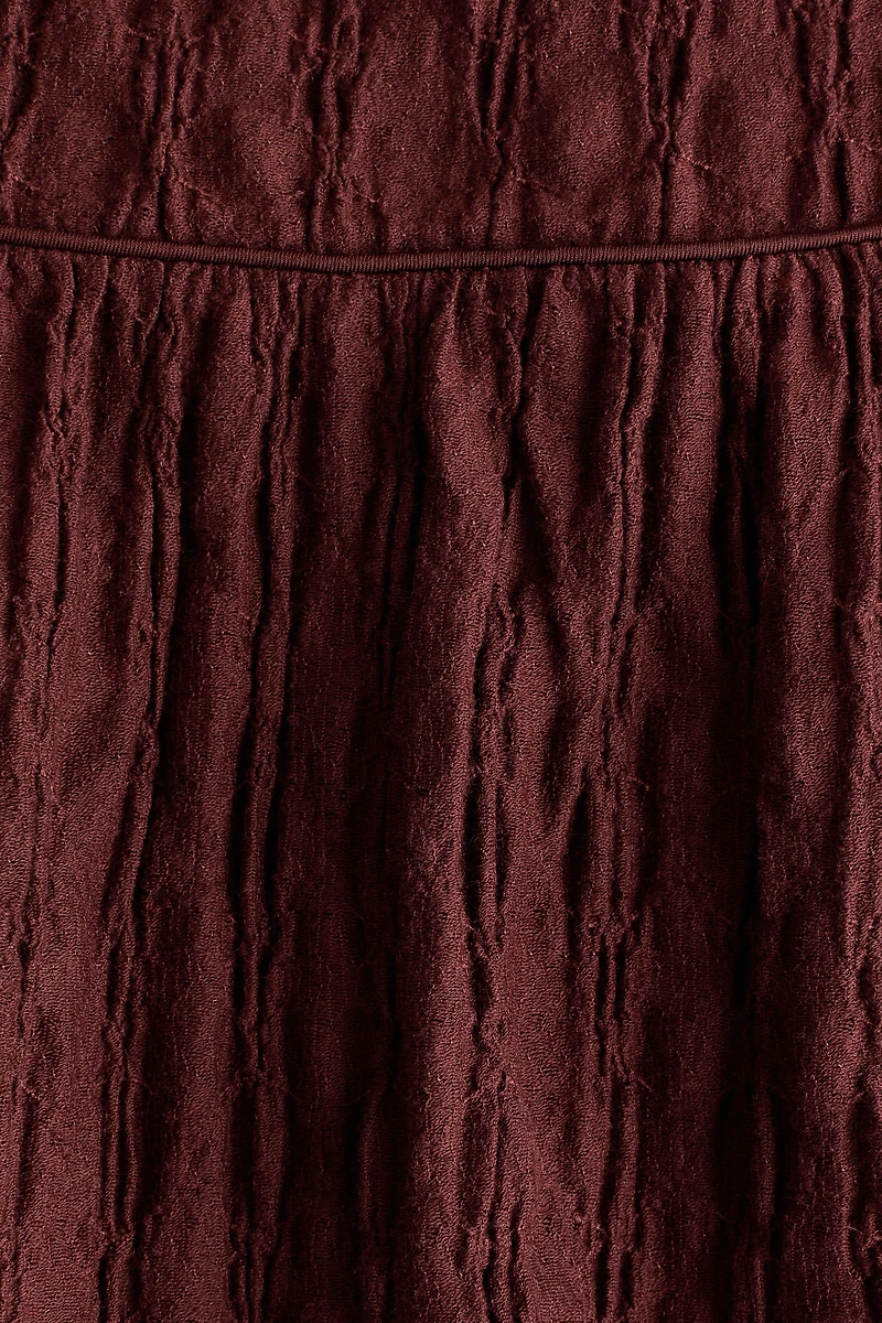 Jupe midi en jersey texturé