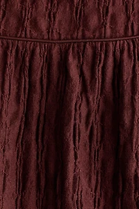 Jupe midi en jersey texturé